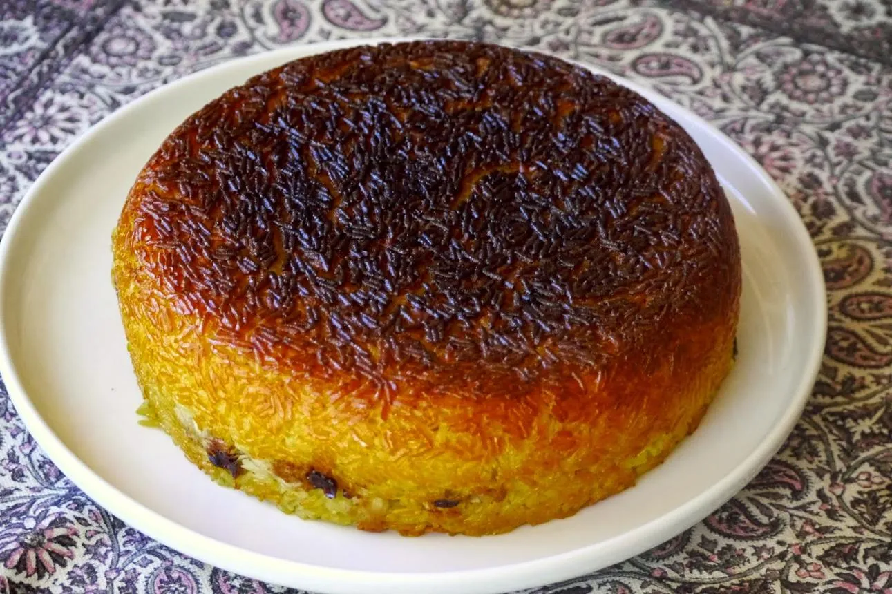 طرز تهیه ته‌چین مرغ شیرازی با بادمجان؛ غذای مجلسی و خوش‌عطر